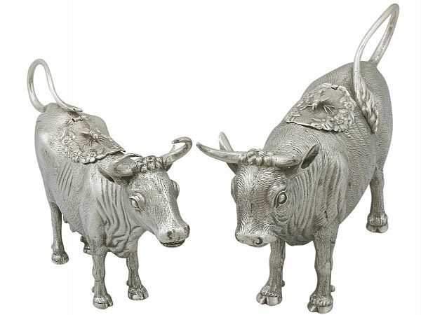 Pair of Silver Cow Creamers