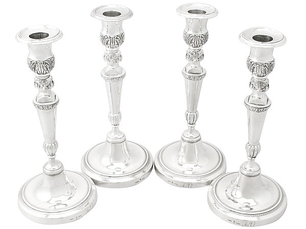 Four Silver Candlestick Holders