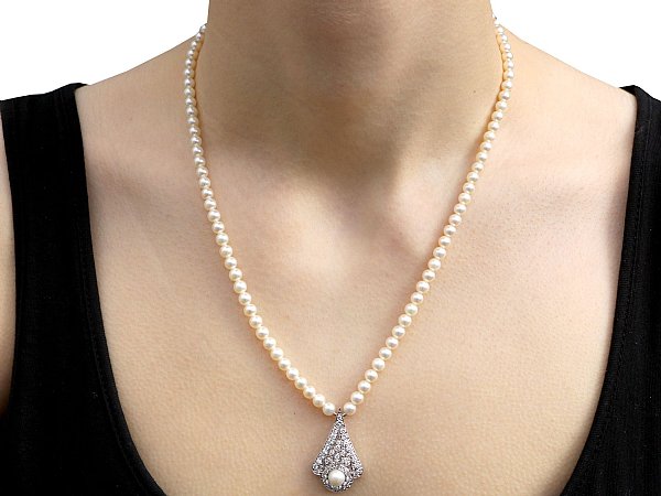 pearl and diamond necklace wearing