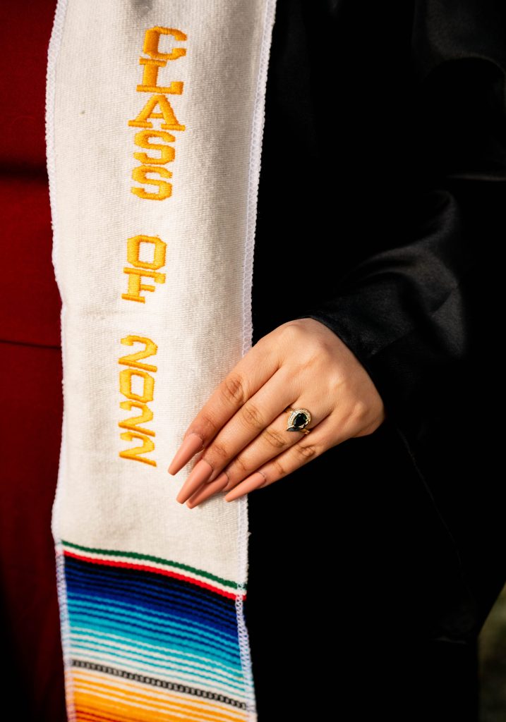 wearing graduation rings
