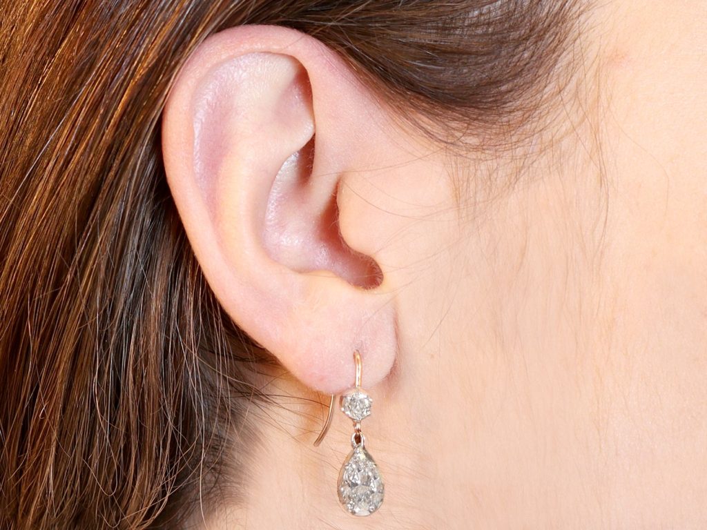 diamond drop earrings with brown hair