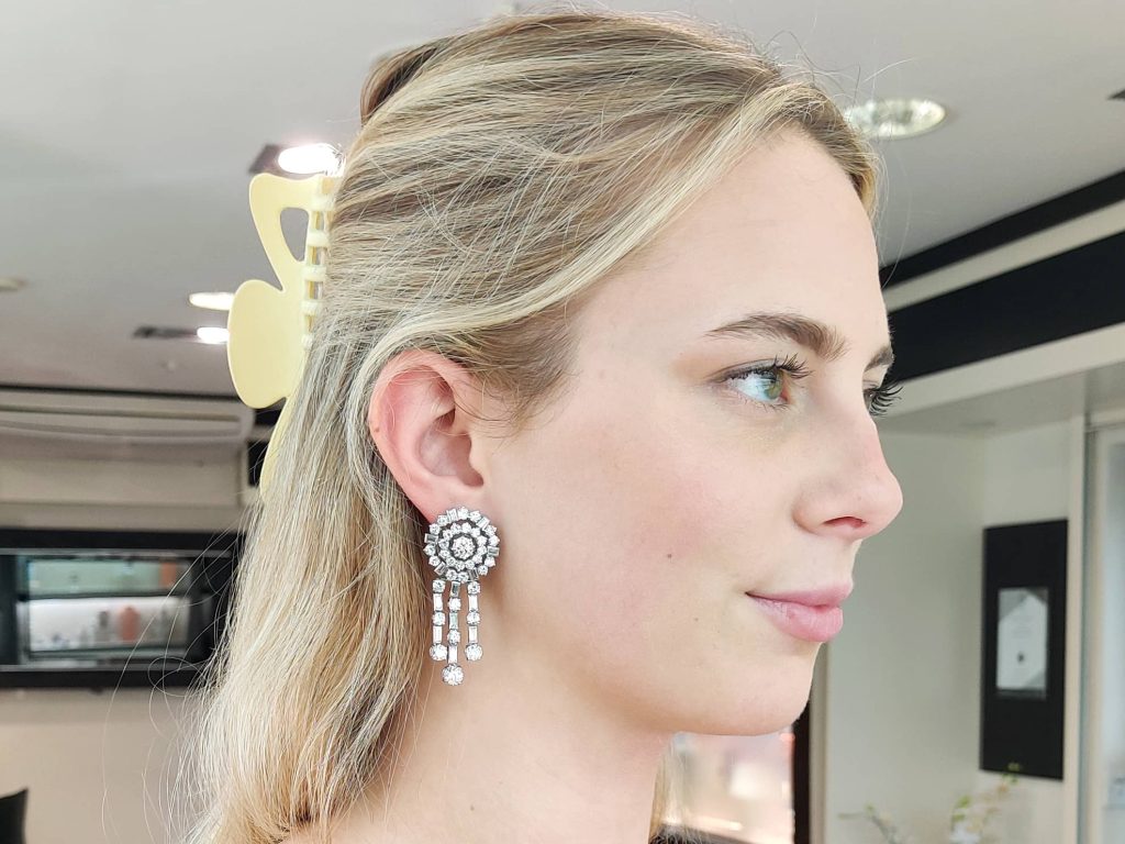 wearing diamond chandelier earrings 