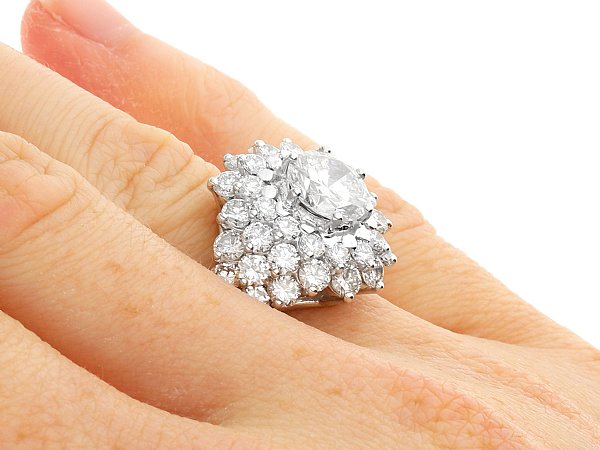 cluster diamond ring on hand 