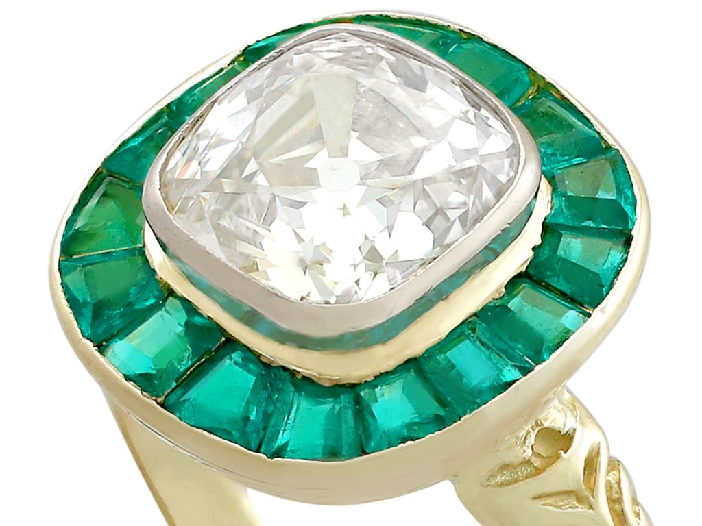 emerald and diamond halo ring