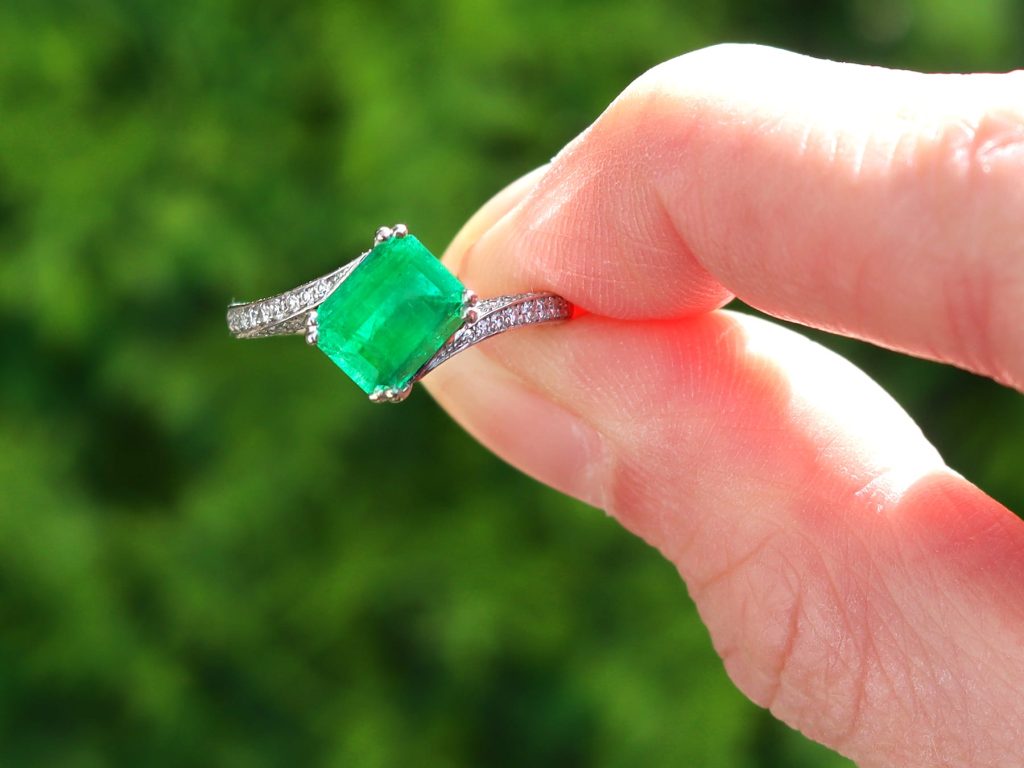 emerald and diamond twist ring 