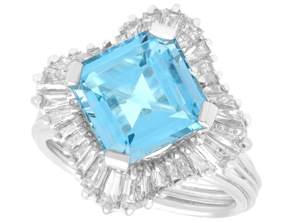 Blue Aquamarine and Diamond Halo Rings
