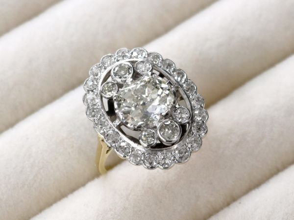 diamond and yellow gold cluster 
